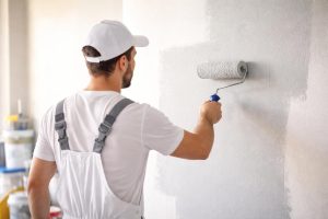 peintre-rouleau-mur-peinture-outils